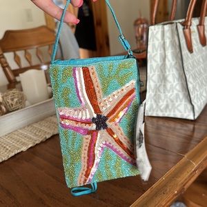 Bamboo trading company fashion clutch